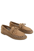 Pair of tan shoes with perforated design on a white background