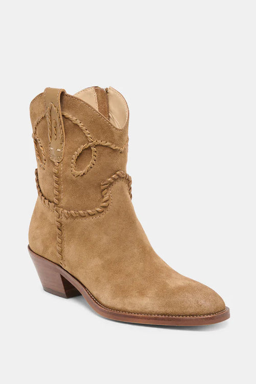 Tan cowboy boot on a white background
