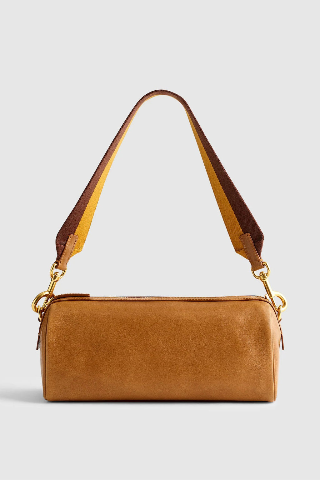 A tan leather shoulder bag with a matching top zipper, gold-tone hardware, and a dual-tone brown and tan shoulder strap, shown against a light gray background.